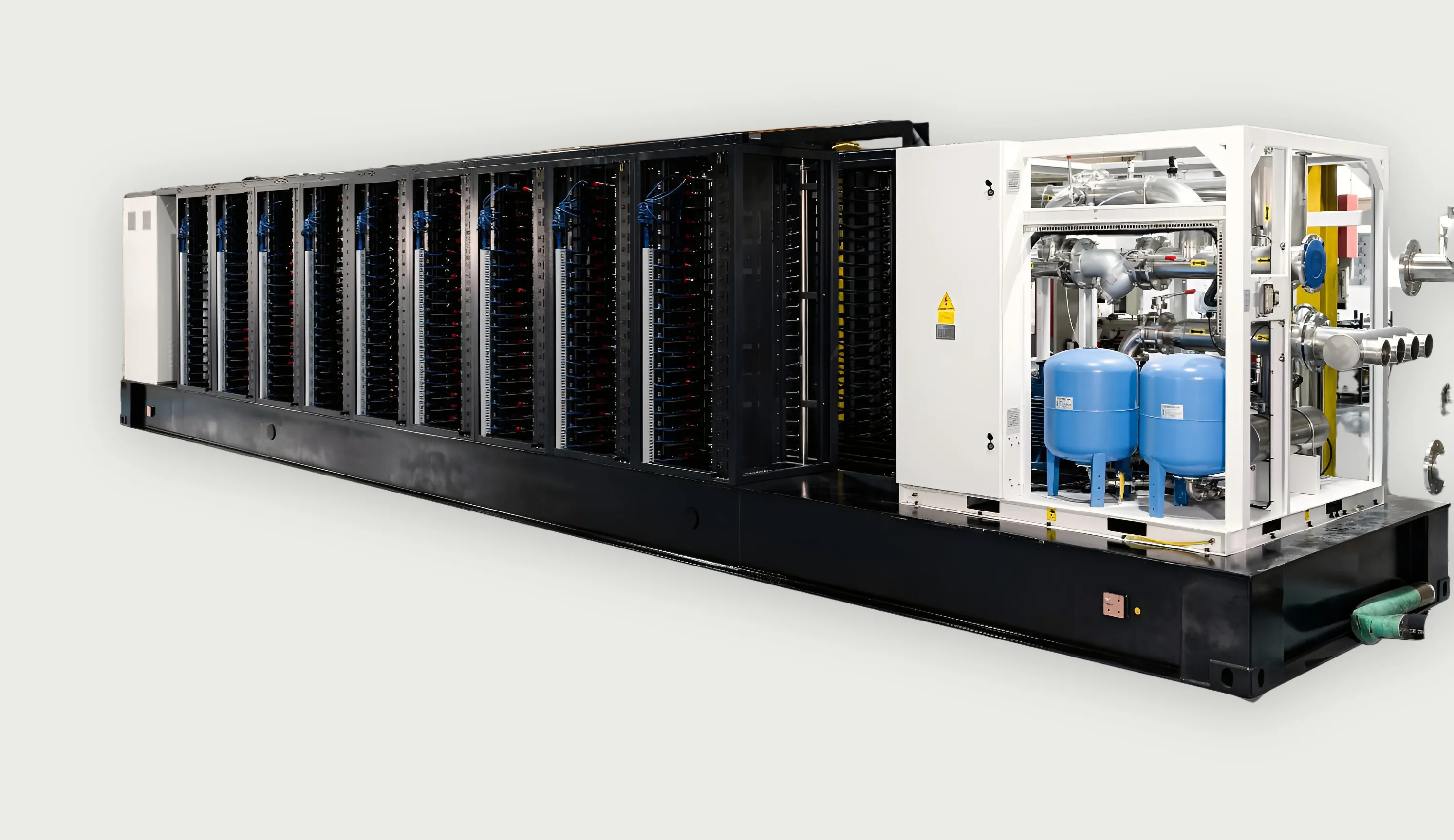 A row of open liquid-cooled racks on a black base frame, with a white frame-mounted CDU at the near end showing pumps, expansion vessels and stainless piping.